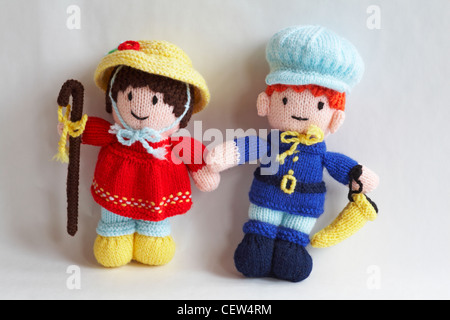 knitted dolls, knitted toys - little Bo Peep and little Boy Blue isolated on white background - knitted doll, knitted toy Stock Photo