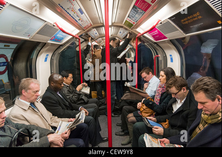 Passengers on Central Line carriage of London Underground train ...