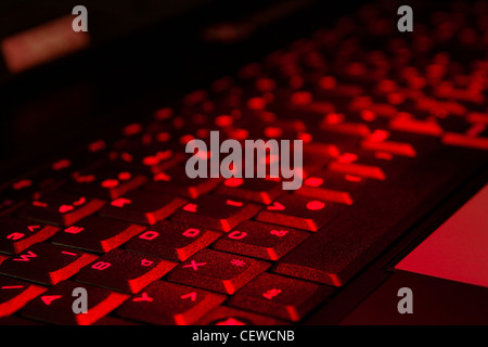 Computer keyboard in red light Stock Photo