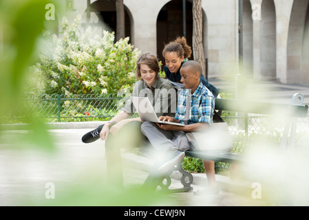University students using laptop computer on campus Stock Photo