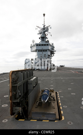 Harrier jet on naval aircraft carrier HMS Illustrius Stock Photo