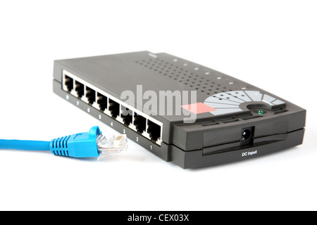 Router with connecting cord on a white background Stock Photo