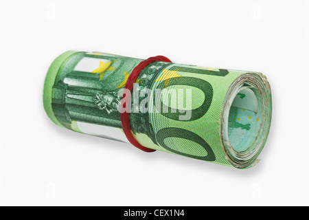 Many 100 Euro bills, rolled up and held together with a rubber. On January 01st 2002 the Euro was introduced as cash. Stock Photo