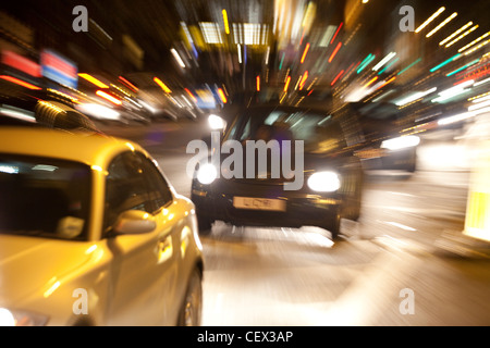 City of Leeds at night with commuter traffic Stock Photo