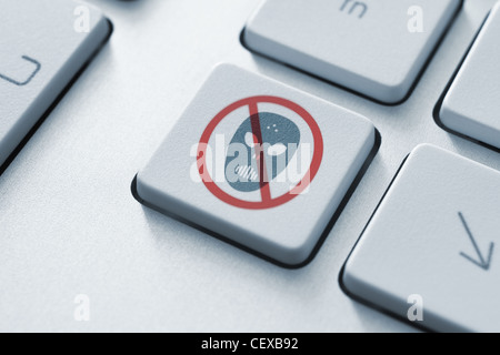 Anti raiders attack button on the keyboard. Toned Image. Stock Photo