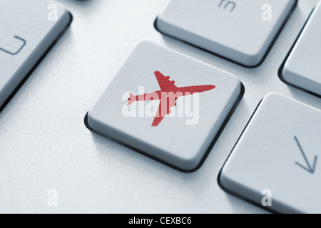 On-line travel tickets button on the keyboard. Toned Image. Stock Photo
