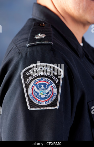 badge on uniform of U.S Customs and Border Protection officer which is a division of U.S Department of Homeland Security Stock Photo