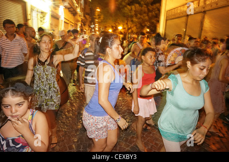 Night Street Dancing with drummers,, San Telmo, Buenos Aires, Argentina Stock Photo