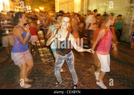 Night Street Dancing with drummers,, San Telmo, Buenos Aires, Argentina Stock Photo