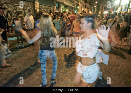 Night Street Dancing with drummers,, San Telmo, Buenos Aires, Argentina Stock Photo