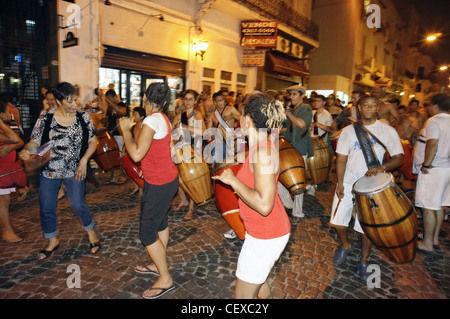 Night Street Dancing with drummers,, San Telmo, Buenos Aires, Argentina Stock Photo