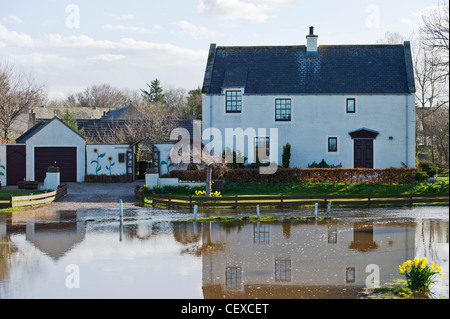 Flood water from River Spey surrounds property in Garmouth, Scotland in April 2010 due to heavy snow melt. Stock Photo