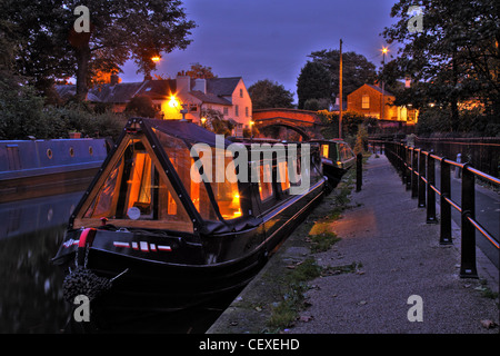 Bridgewater canal Lymm Village moorings, Warrington Cheshire, England, UK at Dusk Stock Photo