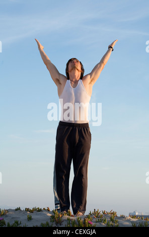 Man doing yoga Stock Photo