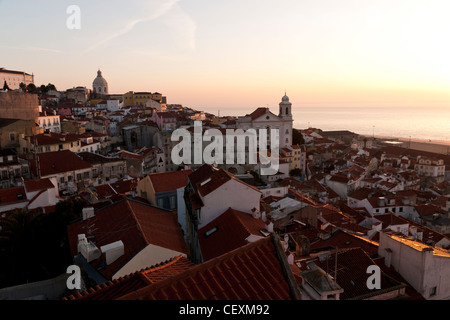 View on Alafama at sunrise from Largos das Portas do Sol. Lisbon, Portugal. Stock Photo