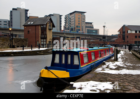 Canal barges frozen in ice after cold weather Sheffield Victoria Quays South Yorkshire England Stock Photo