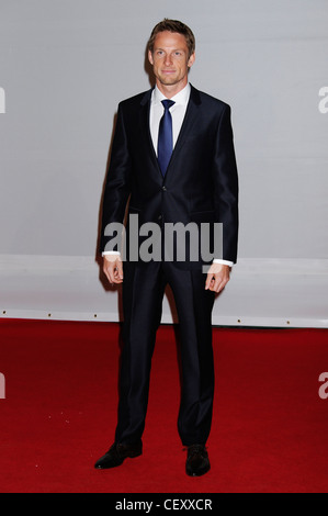 Jenson Button arrives for the Brit Awards 2012 at the O2 Arena, London. Stock Photo