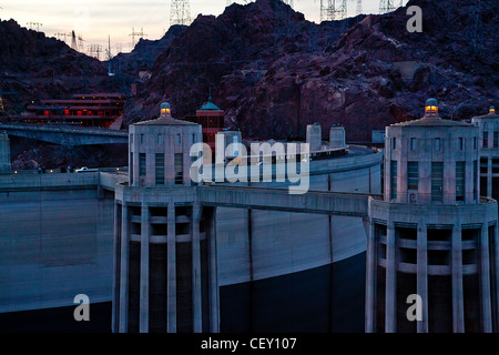 Hoover Dam on the Nevada Arizona border.  Intake tower for power generation with the visitors center and store in the background Stock Photo