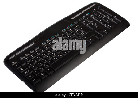 Computer keyboard isolated on white. Selective focus on the enter button. Stock Photo