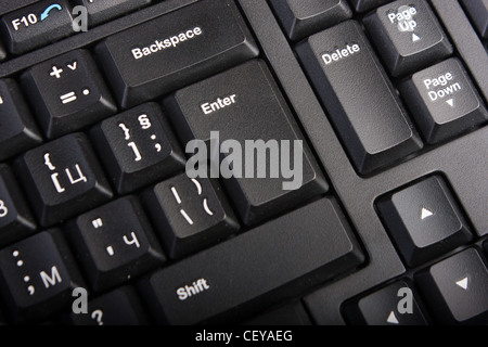 Keyboard with selective focus on the enter button Stock Photo
