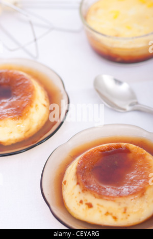 Flan: Sweet custard with a caramel topping. Pudding. Vanilla flavour.  Caramel, known as 'flan' in the US and Spanish. Stock Photo