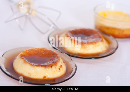 Flan: Sweet custard with a caramel topping. Pudding. Vanilla flavour.  Caramel, known as 'flan' in the US and Spanish. Stock Photo