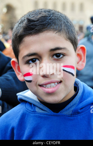 Boy Cairo Egypt with flag painted on face, Tahrir square Cairo Stock Photo