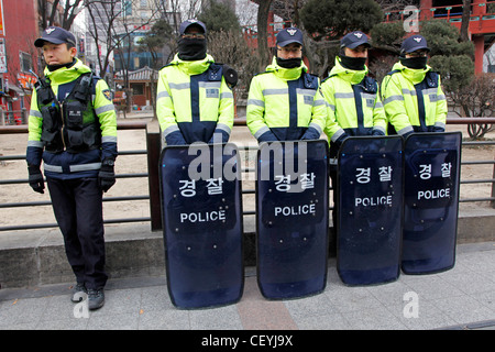Korean riot police with riot equipment and shields in Seoul, South Korea Stock Photo