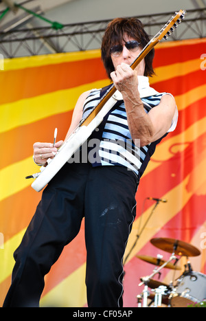 Jeff Beck playing with Jason Rebello on keyboards, Rhonda Smith on bass, and  Narada Michael Walden on drums at Jazz Fest 2011 in New Orleans, LA on day 1. Stock Photo