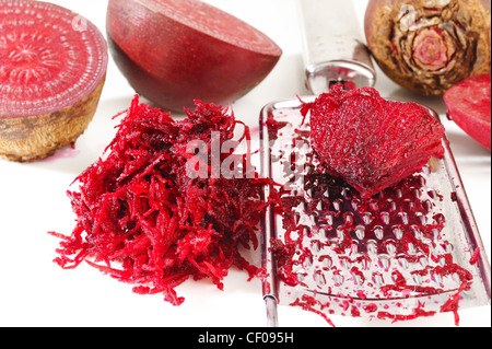 grated beets on a white background Stock Photo