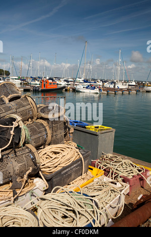 UK, England, Isle of Wight, Yarmouth harbour, fishermen’s lobster pots on the quayside Stock Photo