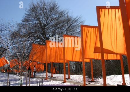 Saffron coloured gates .  Christo and Jeanne-Claude exhibition Central Park, New York Stock Photo