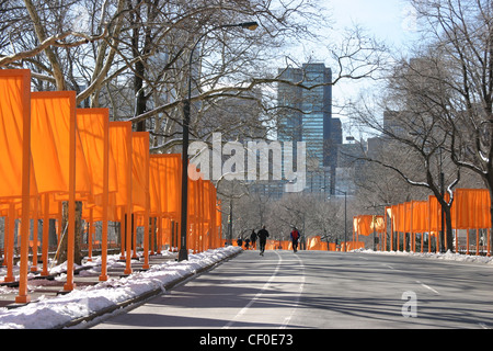 Saffron coloured gates .  Christo and Jeanne-Claude exhibition Central Park, New York Stock Photo