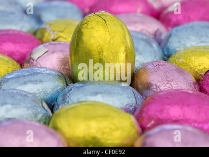 Coloured foil wrapped mini Easter eggs Stock Photo