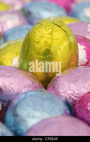 Coloured foil wrapped mini Easter eggs Stock Photo