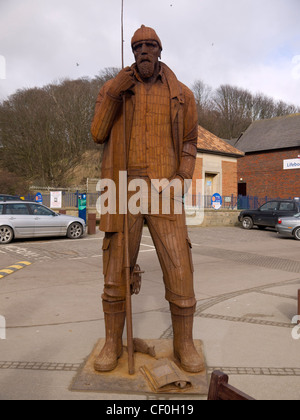 High Tide and Short Wellies large scale steel sculpture of a fisherman by sculptor Ray Lonsdale at Filey North Yorkshire Stock Photo