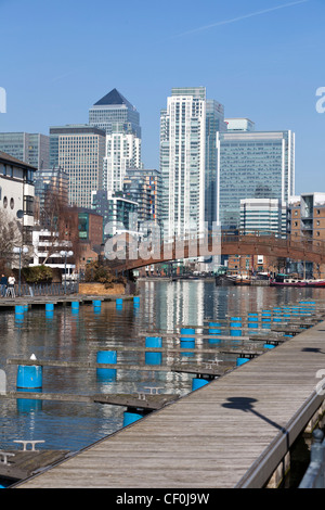 Clippers Quay marina, part of Millwall Outer Dock with Canary wharf in the background, Isle of Dogs, Tower Hamlets, London, UK. Stock Photo