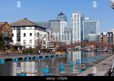 Clippers Quay marina, part of Millwall Outer Dock with Canary wharf in the background, Isle of Dogs, Tower Hamlets, London, UK. Stock Photo