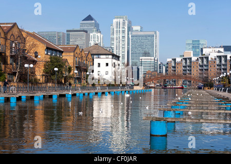 Clippers Quay marina, part of Millwall Outer Dock with Canary wharf in the background, Isle of Dogs, Tower Hamlets, London, UK. Stock Photo