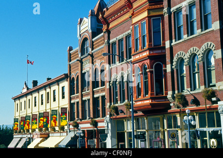 Market Square has popular shopping and dining spots in historical 19th-century brick-and-beam buildings in downtown Victoria, British Columbia, Canada. Stock Photo