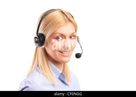 Young female dispatcher with headset, isolated on white background Stock Photo