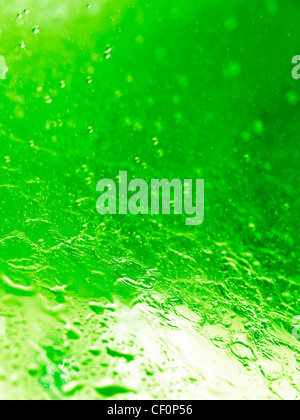Closeup of splashing water abstract green background texture Stock Photo