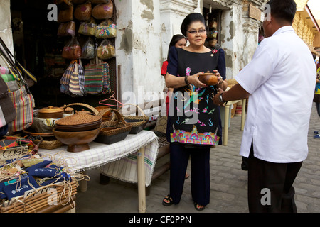 Imelda Marcos shopping amongst supporters in Vican City, Philippines Stock Photo