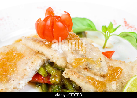 halibut filet roast at lime juice with vegetables Stock Photo