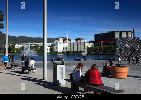 People relaxing near the Cube Sculpture by the lake in the City Park, Bergen City, Hordaland region, Norway, Scandinavia Europe, Stock Photo