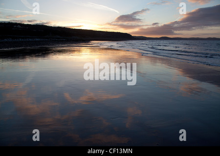 Sunset view of the north Wales coast with the seaside resort of Llandudno and the Great Orme in the background. Stock Photo