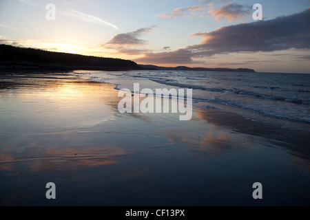 Sunset view of the north Wales coast with the seaside resort of Llandudno and the Great Orme in the background. Stock Photo