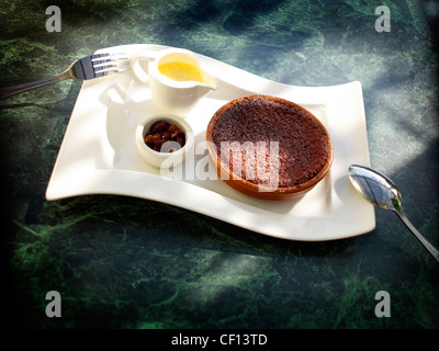 A still life shot of a chocolate flan desert Stock Photo