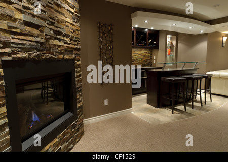 Luxurious residential basement bar with fireplace Stock Photo - Alamy