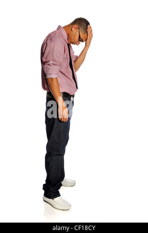 Portrait of stressed African American man standing with hand on head isolated over white background Stock Photo
